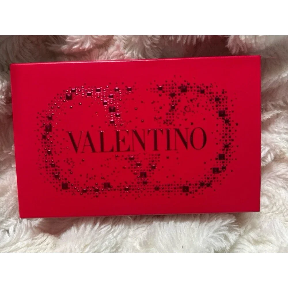 2 lipsticks and case